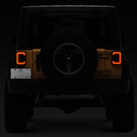 Raxiom 07-18 Jeep Wrangler JK Axial Series LED Halo Tail Lights- Black Housing (Dark Smoked Lens)