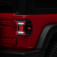 Raxiom 18-22 Jeep Wrangler JL Axial Series Plateau LED Tail Lights- Black Housing (Smoked Lens)