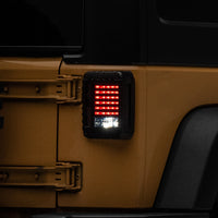 Raxiom 07-18 Jeep Wrangler JK LED Tail Lights- Black Housing (Smoked Lens)