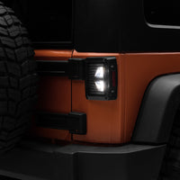 Raxiom 07-18 Jeep Wrangler JK Axial Series Vision LED Tail Lights- Black Housing (Smoked Lens)