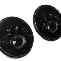 Raxiom 97-18 Jeep Wrangler TJ/JK Axial Series LED Daymaker Headlights- Black Housing (Clear Lens)